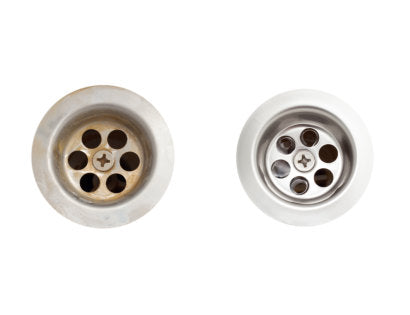 Before and after image of sink after water filtration